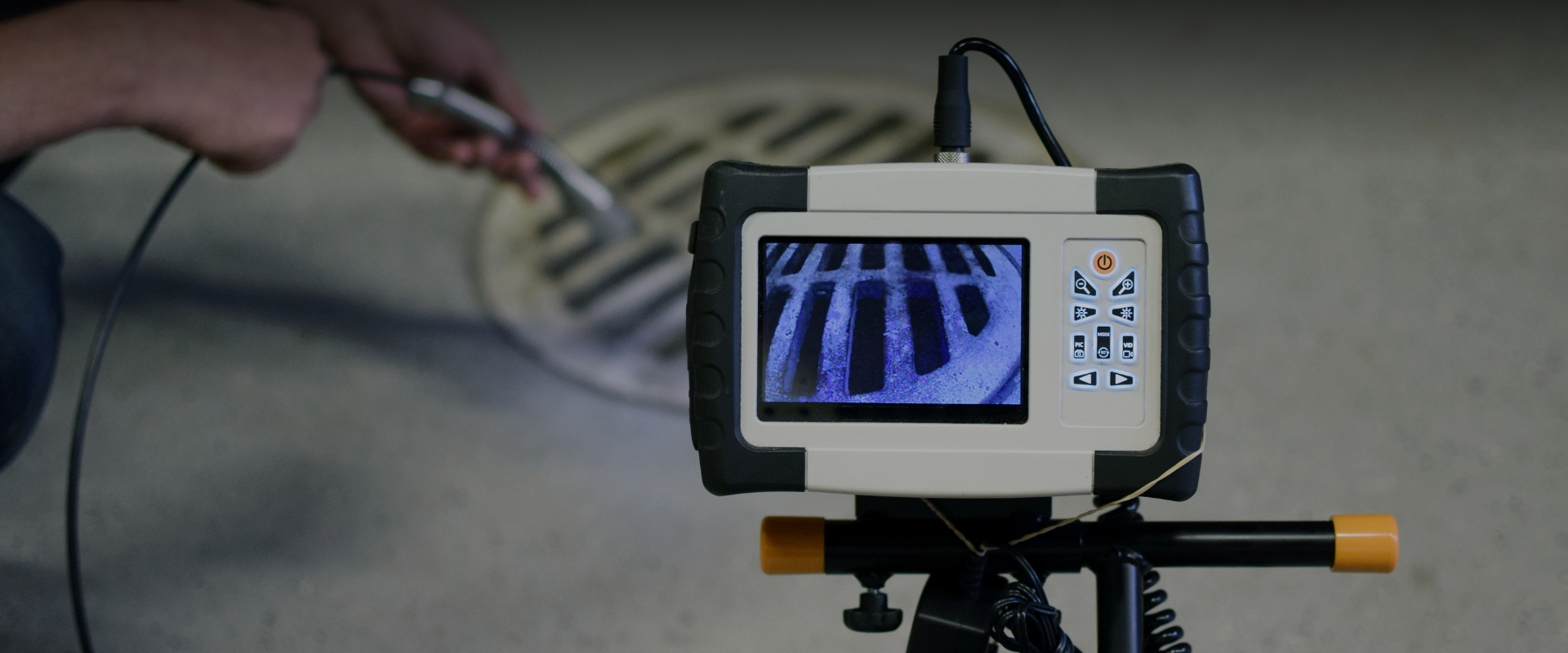 Technician performing a sewer camera inspection